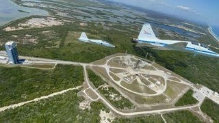 Mike Fincke, backup NASA astronaut for Crew Flight Test (CFT), took this picture of several T-38 jets flying over the NASA Kennedy Space Center Launch Pad 41 for that mission on April 25. Also visible is the jet carrying CFT astronauts Butch Wilmore and Suni Williams. 